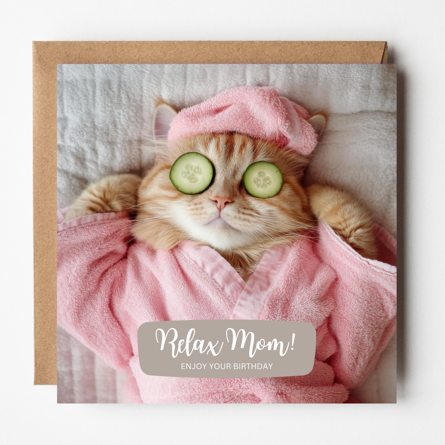 Card design: a ginger cat relaxes in a pink towelled robe with cucumber over her eyes. Text reads: "Relax Mom! Enjoy your birthday".