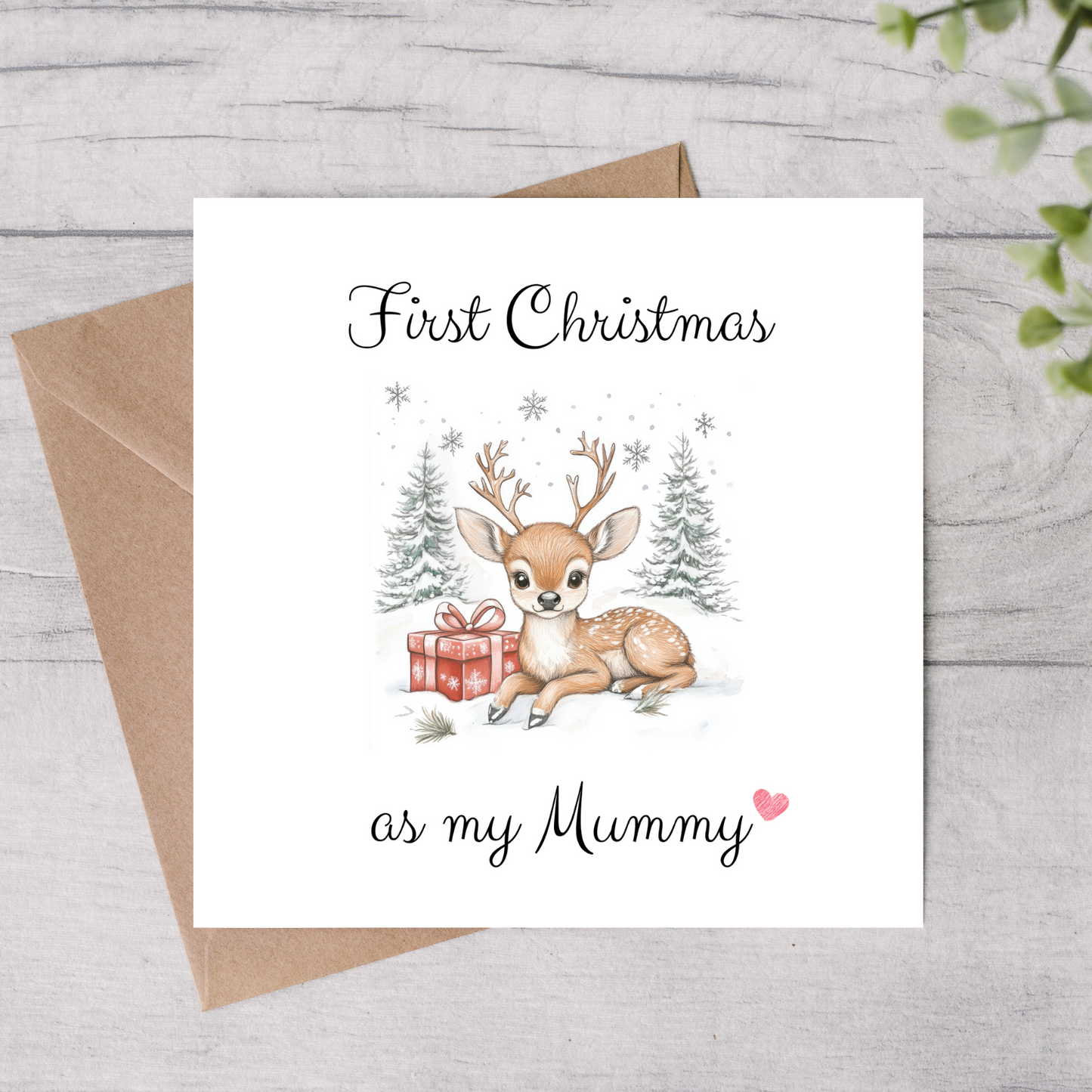The design: cute soft drawing of a baby reindeer lying in the snow. Text reads: "First Christmas as my Mummy".