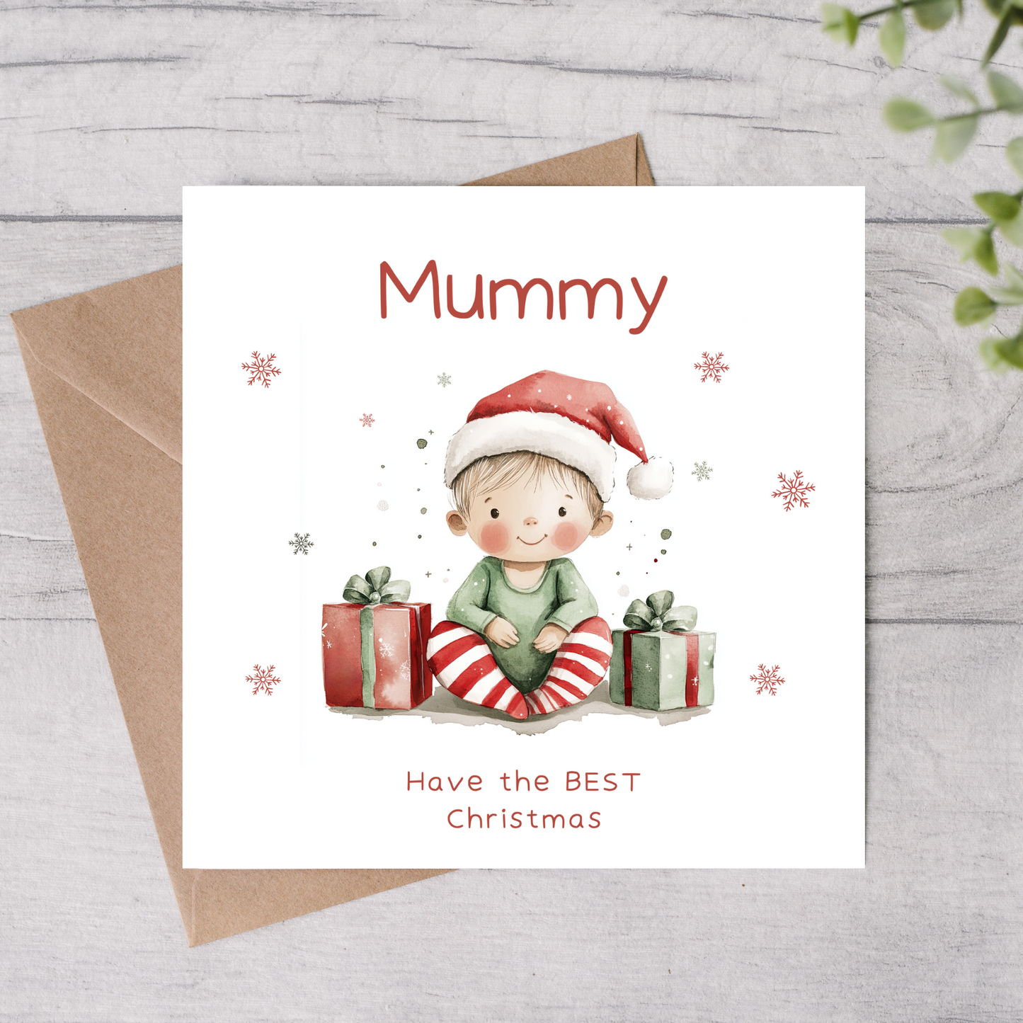 The design: cute watercolour baby dressed as an elf. Text reads: "Mummy - have the BEST Christmas".