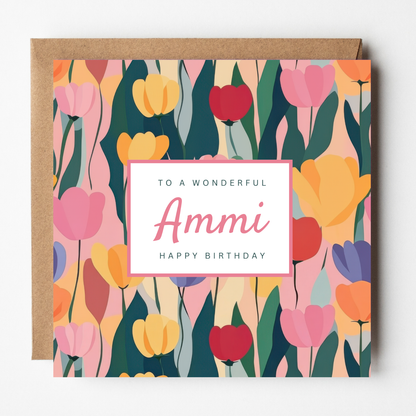 A mockup of the Tulips birthday card for Ammi, shown with brown Kraft envelope.