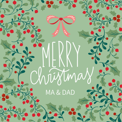The card design: soft green pattern of Christmas foliage, text reads: "Merry Christmas Ma & Dad"