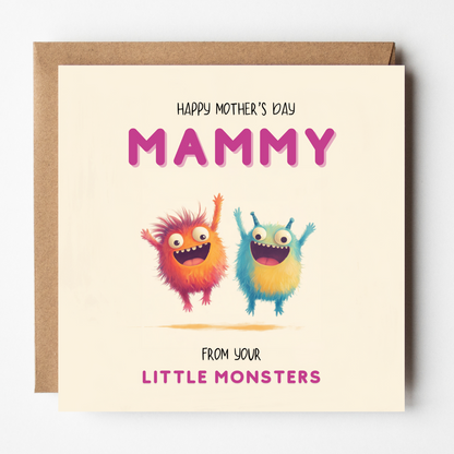 Card design: two cheeky fluffy monsters jumping in the air. Text reads: "Happy Mother's Day Mammy. From your little monsters".