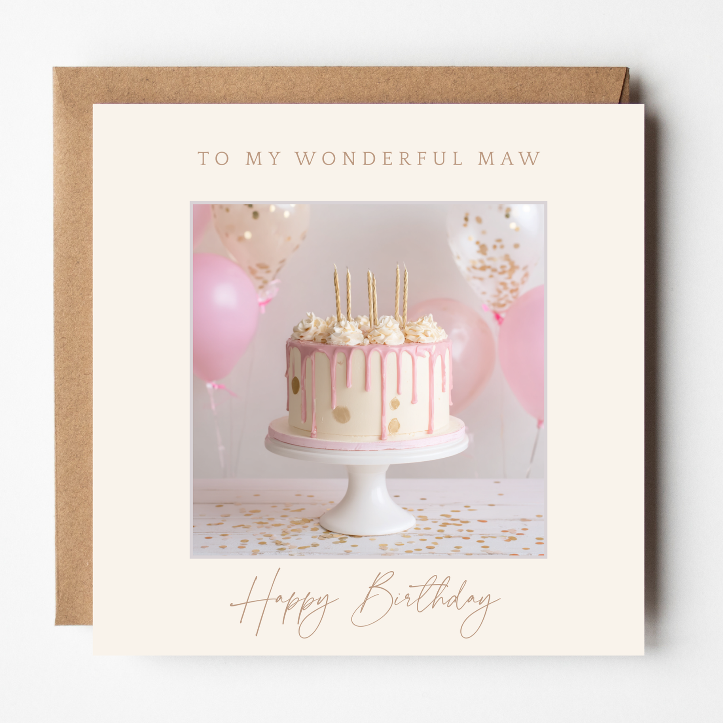 A mockup of the Maw Birthday Cake card, shown with brown Kraft envelope.