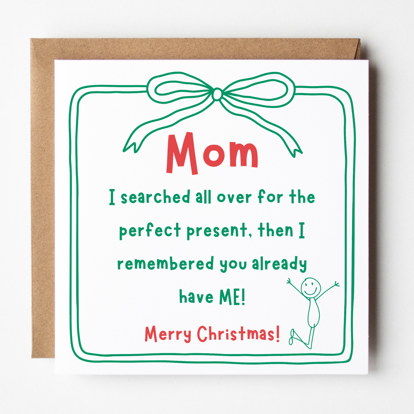A mockup of the Perfect Present Christmas card, shown with brown Kraft envelope.