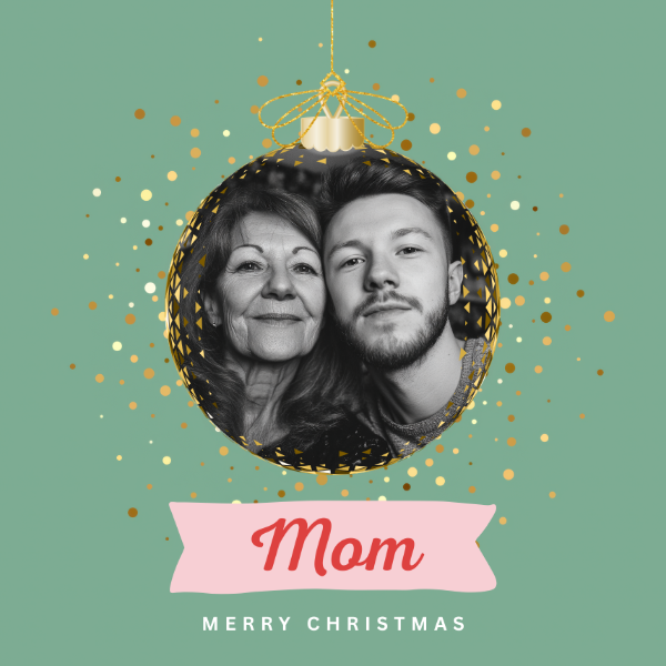 A sample of the Bauble Me Christmas photo card shown with uploaded Mom and son photo.