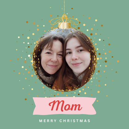 A sample of the Bauble Me Christmas photo card shown with uploaded Mom and daughter photo.