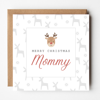 A mockup of the Baby Rudolph Christmas card, shown with brown Kraft envelope.
