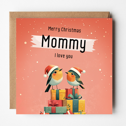 The design: two little xmas robins perched atop a pile of presents. Text reads: Merry Christmas Mommy, I love you.