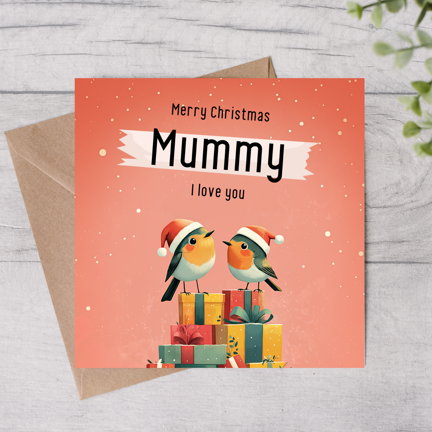 The design: two little xmas robins perched atop a pile of presents. Text reads: Merry Christmas Mummy, I love you.