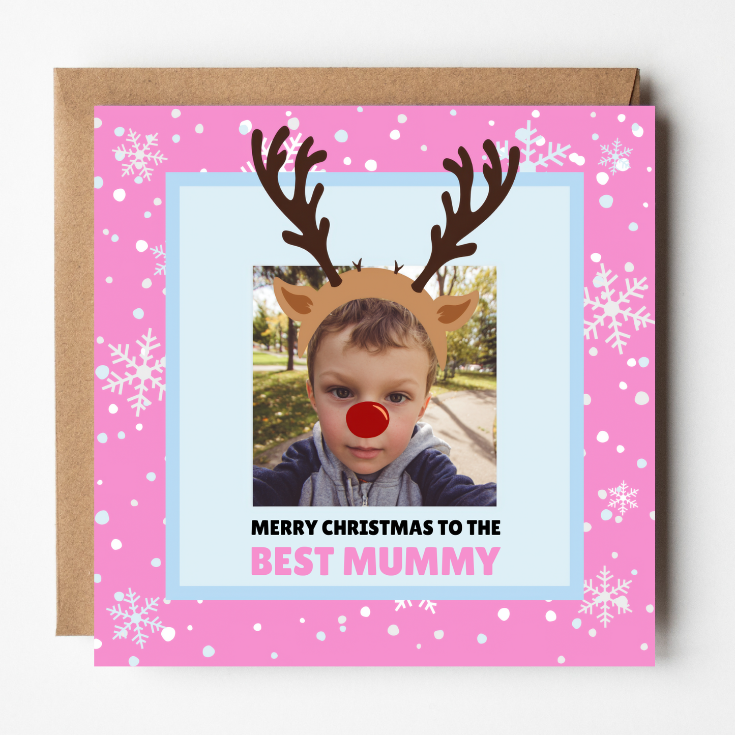 A mockup of the Mummy Christmas Photo Card Little Deer, shown with brown Kraft envelope