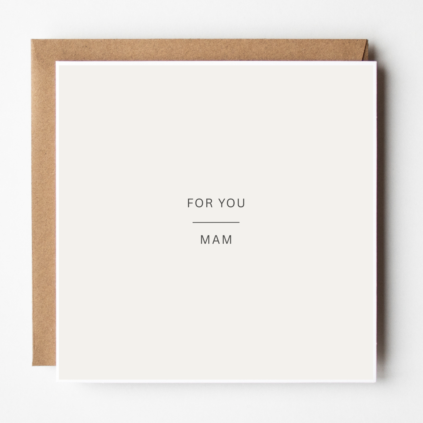 A mockup of the Simple Mother's Day Card For Mam card, shown with brown Kraft envelope.