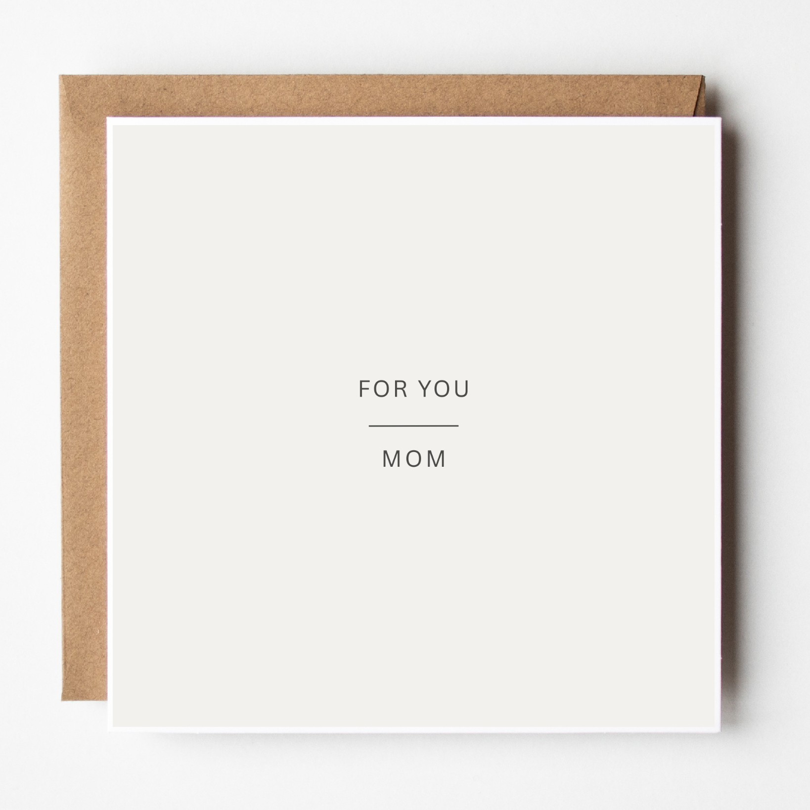 A mockup of the Simple Mother's Day Card For Mom card, shown with brown Kraft envelope.