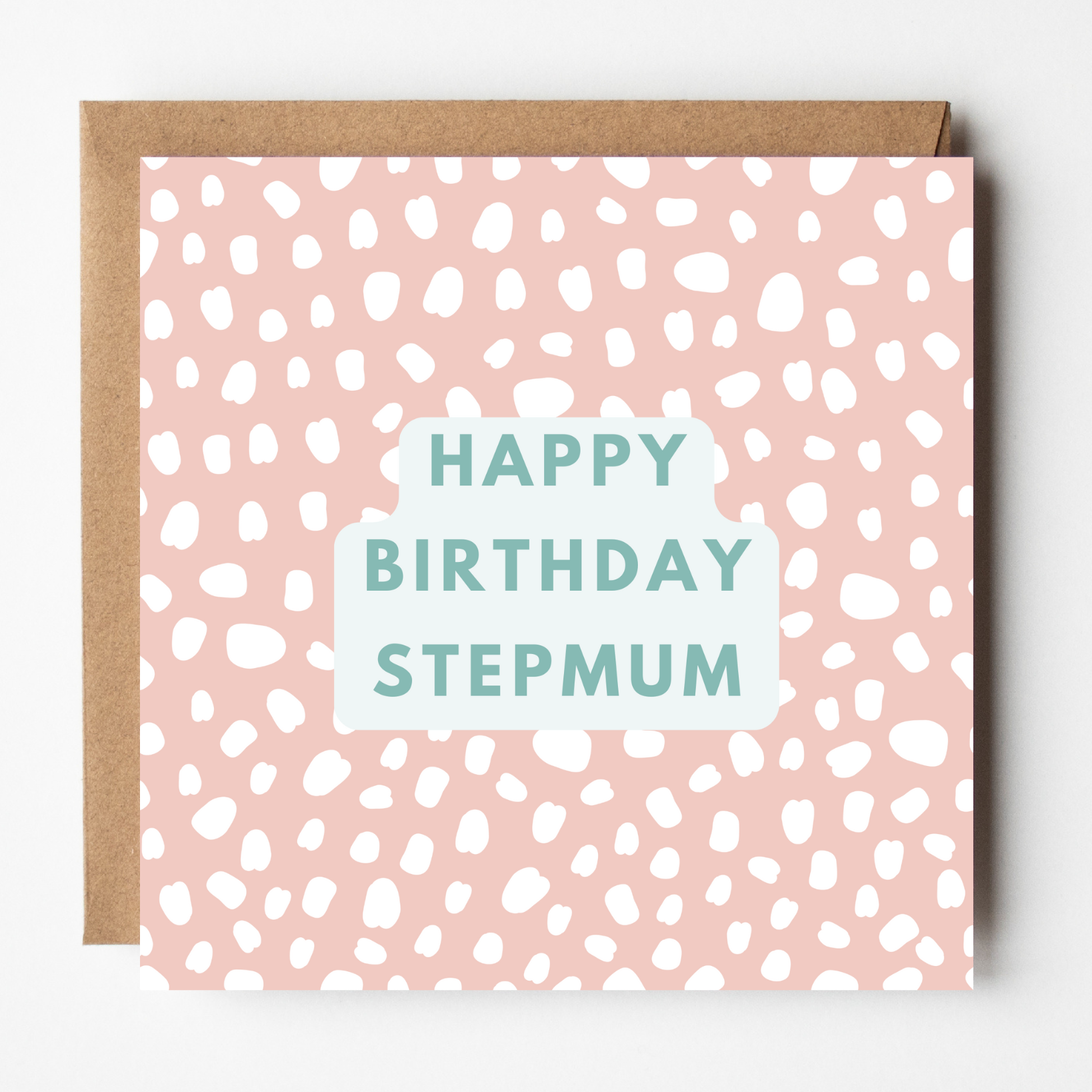 A mockup of the Stepmum Cute Pink birthday card, shown with brown Kraft envelope.